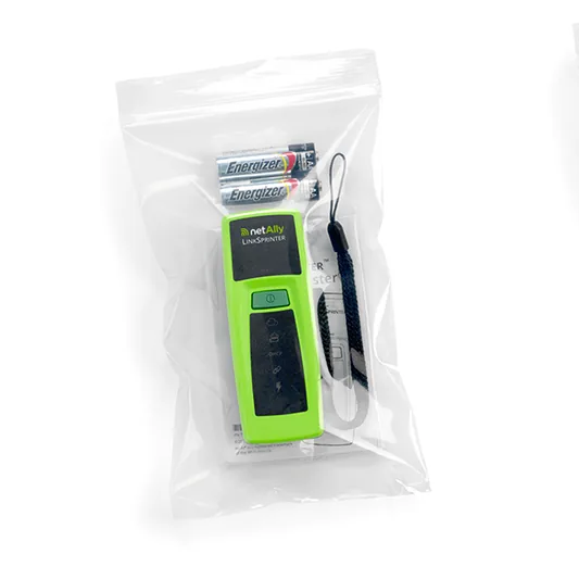 The green NetAlly LinkSprinter 300 in its retail pouch alongside the two AA Energizer batteries it ships with and a wrist lanyard