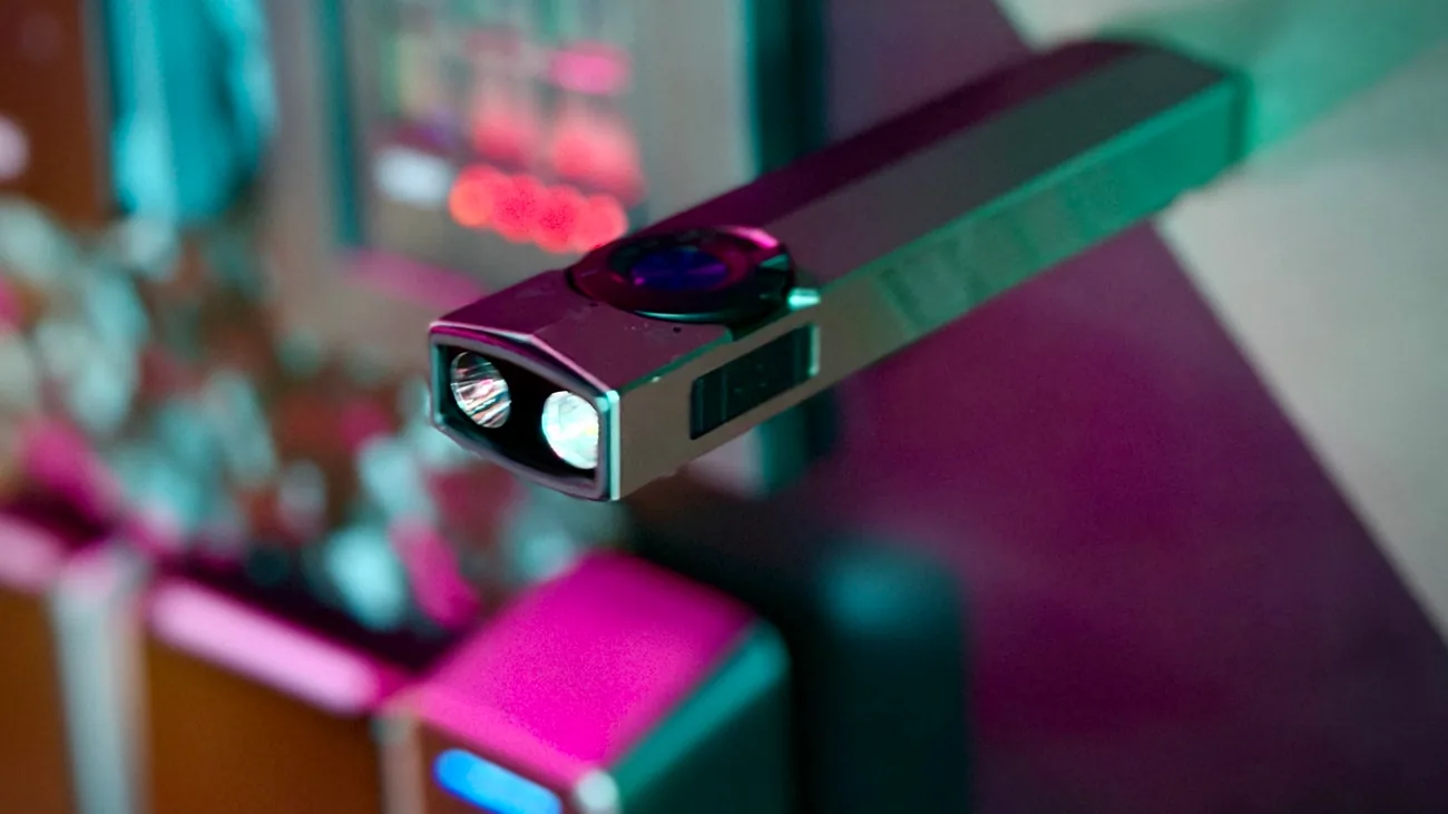 The Olight ArkPro's flood and spotlight emitters, silver graphite unit